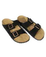 Sandalias planas de dos tiras ajustables, color negro, con hebillas metálicas color cobre. La plantilla es de corcho y látex, con forro de gamuza.
