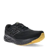 Championes de running New Balance modelo Evoz V4, con capellada de malla técnica negra y entresuela Fresh Foam X de color negro. Presenta suela de goma en tono amarillo y logo lateral característico de la marca.