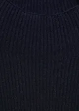 Vestido largo de punto fino, de corte entallado y diseño minimalista. Presenta cuello redondo, mangas largas con puños en contraste y un acabado liso y elegante.