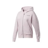 Campera con capucha Reebok de mujer, color lila, con cierre frontal completo, bolsillos tipo canguro y ribetes con el logo de la marca en las mangas. Corte oversize.