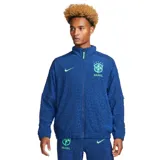 Campera deportiva Nike de la selección de Brasil, color azul con diseño texturizado en relieve tipo animal print. Cuenta con cuello alto, cierre frontal completo, bolsillos laterales y detalles en verde flúor como el logo de Nike y el escudo de la CBF en el pecho.