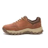 Championes Caterpillar de cuero color marrón, con diseño robusto y suela de goma antideslizante. Presenta cordones reforzados, entresuela de EVA y detalles de la marca en el lateral y la puntera.
