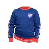 Buzo azul de cuello redondo con detalles en rojo y blanco, bandas laterales en las mangas y escudo del Club Nacional de Football bordado en el pecho.