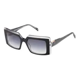 Lentes de sol Teresa Calandra modelo Cheryl, con armazón rectangular de acetato en combinación de negro y transparente, y cristales degradados en tono gris.