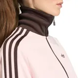 Campera deportiva Adidas con cierre frontal, cuello alto, bolsillos laterales con cierre y puños y ruedo acanalados. Presenta diseño en color rosado con detalles en marrón oscuro, incluyendo las icónicas tres tiras en las mangas y el logo del trébol bordado en el pecho.