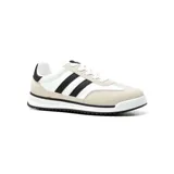 Championes deportivos American Sport Resh Zen, color blanco con detalles en negro y beige. Diseño con tres tiras laterales negras y suela blanca con detalles negros.