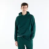 Canguro New Balance de felpa francesa verde oscuro, de corte holgado, con capucha, bolsillo tipo canguro y logotipo bordado en el pecho.