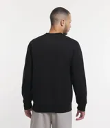 Buzo deportivo color verde claro, de manga larga y cuello redondo. Confeccionado en tejido de poliéster, viscosa y elastano.