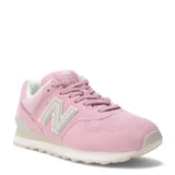 Championes urbanos New Balance modelo 574, color rosado, confeccionados en gamuza y pana, con logo "N" característico en los laterales y entresuela ENCAP.