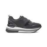 Zapatillas urbanas negras con detalles de charol y glitter, plataforma blanca con rayas horizontales negras.