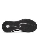 Championes de básquet Under Armour Curry 3Z 25 SDE, color negro con detalles en blanco. Presentan una parte superior que combina cuero y malla transpirable, con entresuela Charged Cushioning para mayor reactividad y suela de goma con patrón de tracción anatómico.