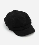 Boina negra de tweed con forma abullonada y visera curva.