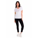 Remera blanca de algodón con cuello en V y logo de Caterpillar estampado en plateado.