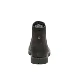 Bota tipo Chelsea de cuero nobuk texturizado en color negro, con paneles elásticos laterales y suela de goma resistente con tracción.