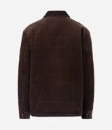Campera puffer de Marfinno confeccionada en tejido de cotelé de algodón, con diseño acolchado, cuello inglés, cierre frontal con botones y dos bolsillos con solapa en el pecho.