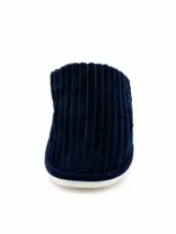 Pantufla abierta de pana azul marino con interior de corderito sintético color crema y suela plana.