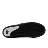 Championes New Balance Numeric 306, color azul marino con detalles en blanco y negro. Confeccionados en gamuza y material sintético, con el logo "N" en blanco en los laterales y suela de goma negra.