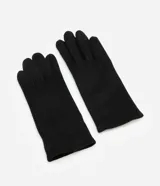 Guantes de mujer confeccionados en poliéster con acabado suave, diseño liso y sin puño.