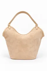 Bolso tipo hobo confeccionado en gamuza y PU, en color beige, con asa superior fija.