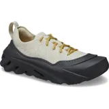 Championes Crocs Echo Surge de diseño deportivo y urbano. Presentan una parte superior de punto elástico en color verde militar con cordones tradicionales en tono celeste y blanco. Cuentan con una entresuela gruesa y exagerada de color beige con aberturas laterales y plantilla LiteRide.