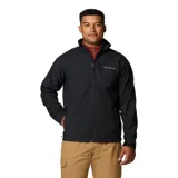 Chaqueta softshell negra con cierre frontal completo, cuello alto con protector de mentón, bolsillo vertical con cierre en el pecho y bolsillos laterales con cierre. Cuenta con puños ajustables y tecnología resistente al agua y al viento.