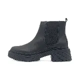 Botas de cuero marrón con suela track negra, diseño estilo Chelsea con inserciones elásticas laterales y cierre lateral.