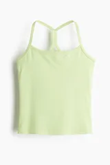 Top deportivo color verde menta, con escote en U, soutien incorporado y finos breteles cruzados en la espalda.