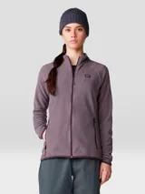 Campera polar de mujer con cierre frontal completo, cuello alto y bolsillos laterales con cierre. Confeccionada en tejido de vellón de poliéster reciclado, presenta un diseño de manga raglán para mayor movilidad y logo bordado en el pecho.