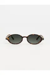 Lentes de sol Tiwi modelo Bell con armazón ovalado de acetato en color carey (tortoise) y cristales verdes degradados.