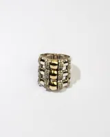 Anillo ancho de plata 925 con apliques de oro y circonias blancas.