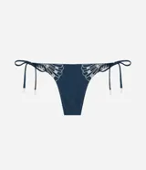 Bombacha de bikini azul marino con lazos laterales ajustables y bordado artesanal de caracolas en los laterales.