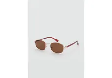 Lentes de sol con montura metálica ovalada dorada y cristales oscuros.