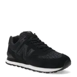 Championes urbanos New Balance modelo 574, color negro con textura de piel de serpiente en paneles laterales y puntera. Presenta el logo N característico en los laterales, entresuela blanca con motas negras y suela de goma.