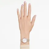 Reloj Swarovski Certa de acero inoxidable con baño en tono oro rosa y plateado. Cuenta con caja redonda, bisel con cristales en pavé, esfera guilloché blanca con índices de cristales y brazalete metálico de siete eslabones bicolor.
