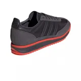 Championes Adidas SL 72 RS color gris oscuro con detalles en rojo en la entresuela y la suela, confeccionados con superposiciones de gamuza y detalles de las tres tiras características de la marca en los laterales.