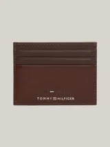 Tarjetero Tommy Hilfiger de cuero marrón con logo en la parte delantera. Cuenta con múltiples ranuras exteriores para tarjetas y un compartimento abierto.