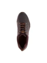 Zapato casual Cat modelo Instruct, confeccionado en cuero marrón con detalles en textil. Presenta cordones al tono, suela de goma flexible con relieve y logo de la marca en el lateral.