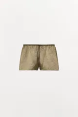 Shorts tiro medio de mezcla de cupro con acabado jacquard y cintura elástica.