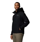 Chaqueta softshell negra con capucha desmontable, cierre frontal completo y bolsillos con cremallera. Presenta logo de la marca bordado en el pecho y puños ajustables.