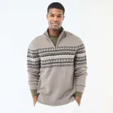 Sweater de punto en color beige con diseño jacquard geométrico en la parte superior. Presenta cuello chimenea con cierre frontal parcial y puños y ruedo acanalados.