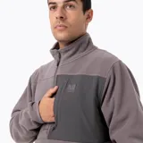 Buzo polar de microfleece con media cremallera frontal, cuello alto y bolsillo en el pecho con cierre. Presenta un panel de contraste en nylon ripstop en la parte superior y puños con ajuste elástico.