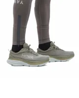 Championes Hoka Bondi 8 color verde oliva con detalles en verde claro y suela blanca.