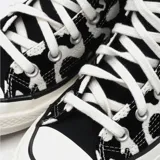 Championes Converse Chuck 70 de caña alta con estampado animal print en blanco y negro.