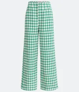 Pantalón de tweed a cuadros verdes y blancos, de corte amplio y cintura alta.