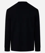 Remera de manga larga con cuello redondo y textura, de corte regular. Confeccionada en una mezcla de algodón, poliéster y viscosa.