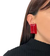 Aros colgantes rectangulares de resina color turquesa con ajuste de clip.