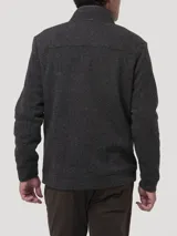 Buzo polar de hombre con medio cierre frontal y cuello alto con aplicación de gamuza. Presenta un tejido con textura de espiga en color gris oscuro y el parche bordado del pato característico de la marca en el pecho.