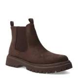 Botas Chelsea de mujer color marrón oscuro, estilo botín, con caña corta y paneles elásticos laterales. Cuentan con suela track gruesa y tiradores en el talón y la abertura frontal para facilitar el calce.