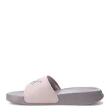Sandalias tipo ojota Puma modelo Popcat 20, con base y suela en color lila y banda superior en color rosado con el logo de la marca en relieve.