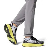 Championes de trail running Columbia Konos Elevate Techlite, color negro, blanco y amarillo, con diseño estampado y entresuela de gran amortiguación.